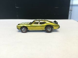 Redline Hotwheels Olds 442,  Yellow. ,  soft wing,  Not sure on stripes. 2