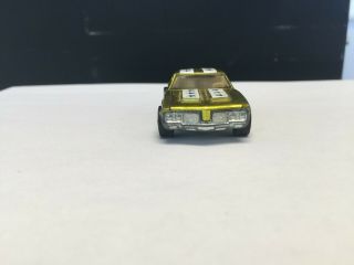 Redline Hotwheels Olds 442,  Yellow. ,  soft wing,  Not sure on stripes. 6