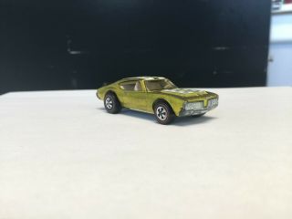 Redline Hotwheels Olds 442,  Yellow. ,  soft wing,  Not sure on stripes. 7