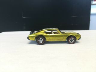 Redline Hotwheels Olds 442,  Yellow. ,  soft wing,  Not sure on stripes. 8