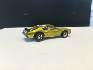 Redline Hotwheels Olds 442,  Yellow. ,  soft wing,  Not sure on stripes. 9