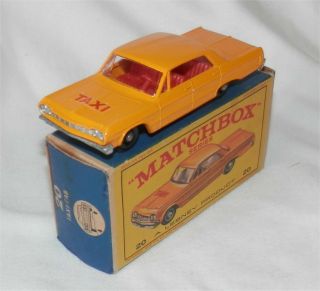 1960s.  Matchbox.  Lesney 20.  Chevrolet Impala Yellow Taxi Cab.  Orange.  Red Interior