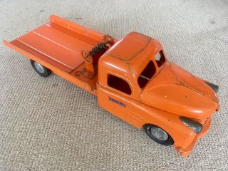 Structo Toys Orange Pressed Steel Flatbed Winch Truck