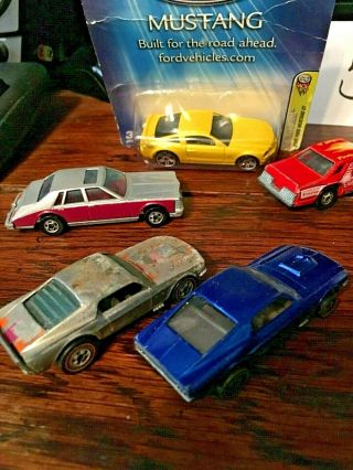 Red line mustangs hot wheels,  and other collectible cars 3